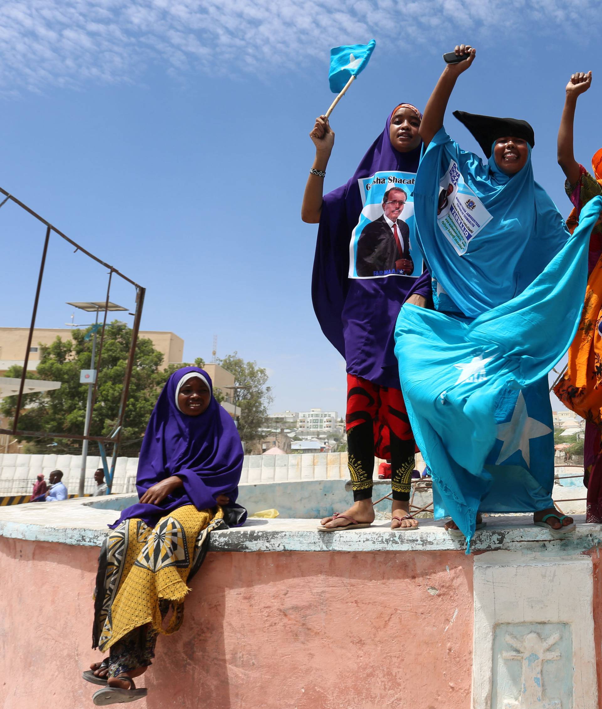 Somali women sing as they celebrate the election of President Mohamed Abdullahi Mohamed in the streets of Somalia's capital Mogadishu