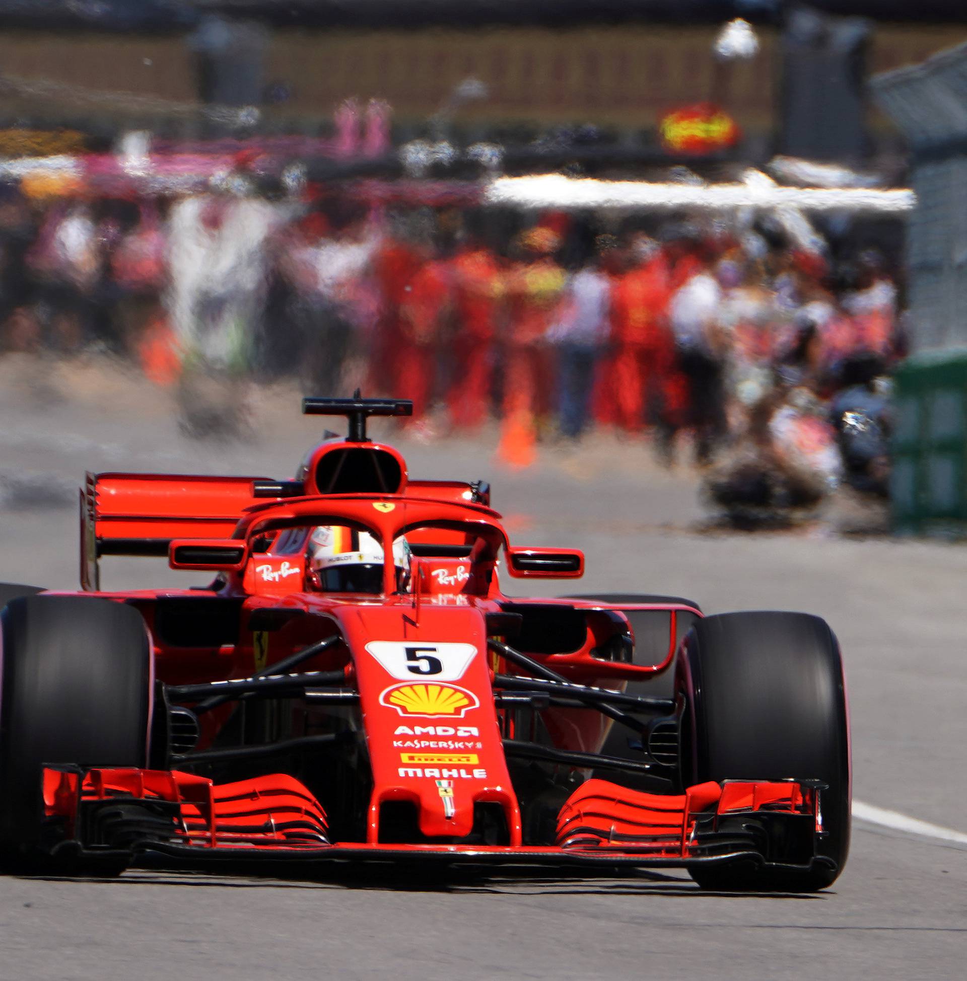 Ferrari's Sebastian Vettel  drives during a practice session at Circuit Gilles Villeneuve during a practice session for the F1 race in Montreal