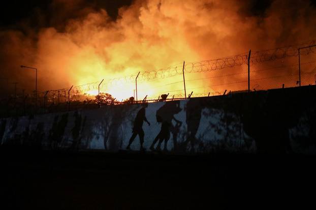 Fire burns at the Moria camp for refugees and migrants on the island of Lesbos