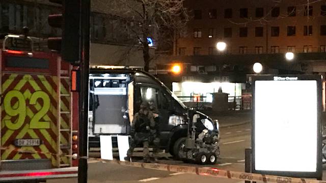 Members of Oslo police bomb squad work at the scene the after the discovery of a "bomb-like device", in Oslo
