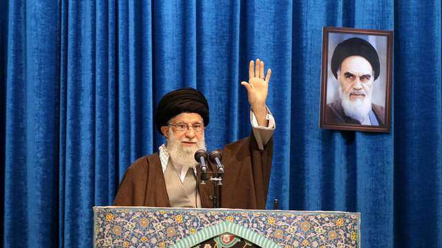 Iran's Supreme Leader Ayatollah Ali Khamenei gestures as he delivers Friday prayers sermon, in Tehran
