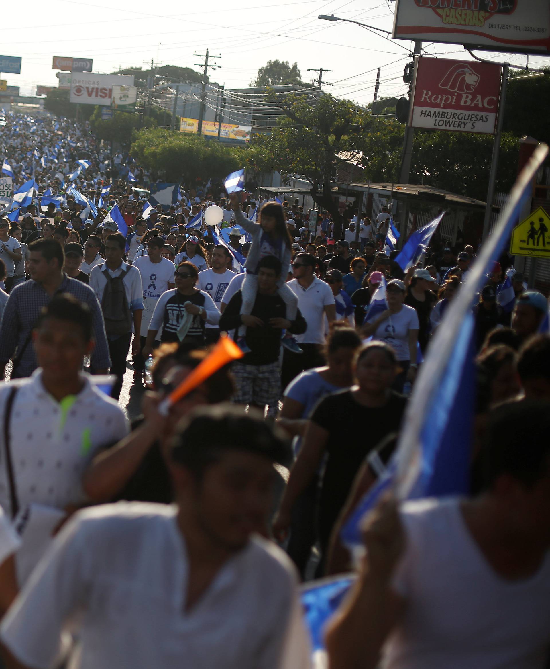 Demonstrators protest against police violence and the government of Nicaraguan President Daniel Ortega in Managua