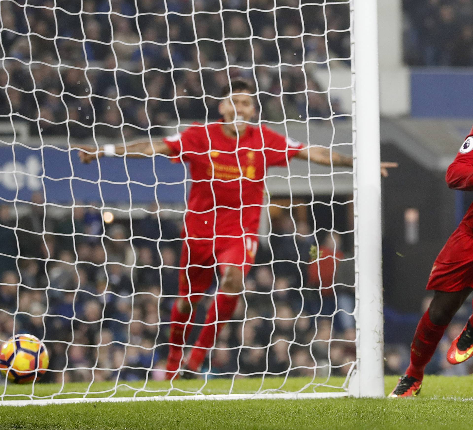 Liverpool's Sadio Mane celebrates scoring their first goal