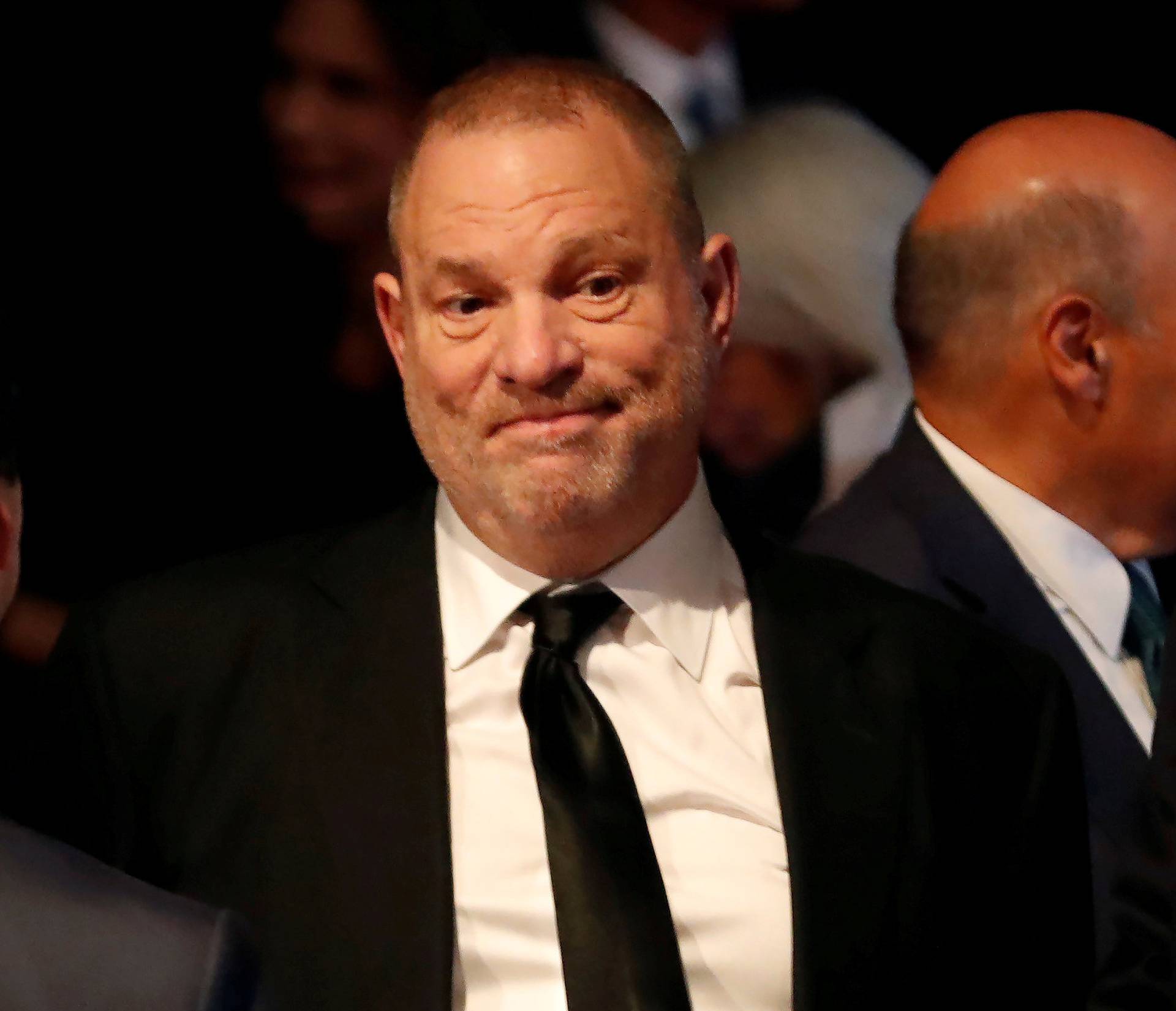 FILE PHOTO: Producer Weinstein stands in the audience ahead of the first presidential debate between U.S. presidential nominee Donald trump and U.S. presidential nominee Clinton in Hempstead