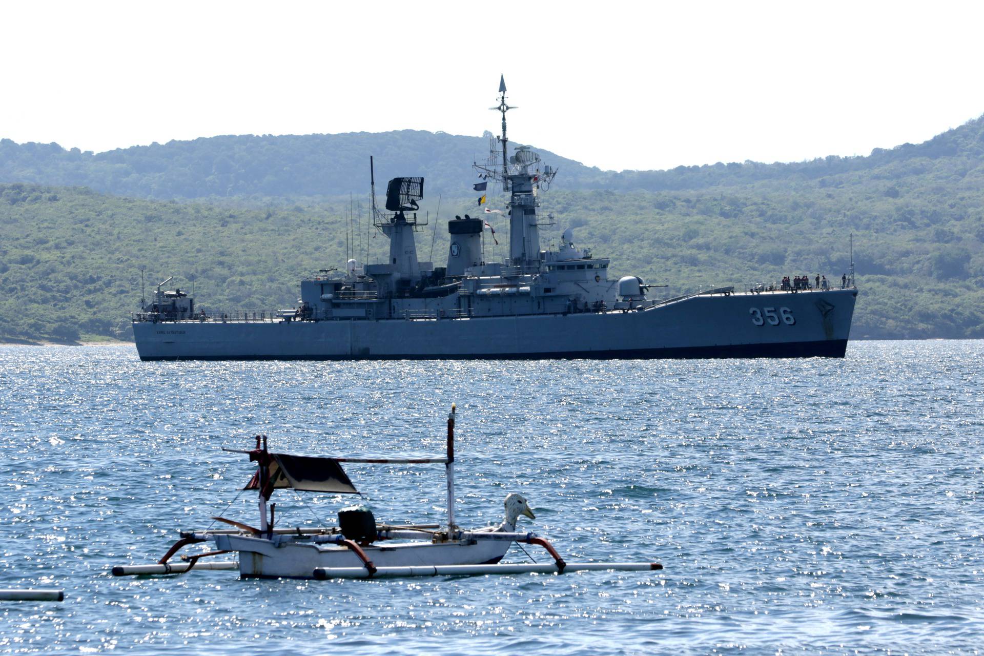 Indonesian Navy's KRI Karel Satsuitubun-356 is seen while preparing to dock at Tanjung Wangi port, as it is being prepared for rescue operation of the KRI Nanggala-402 that lost contact yesterday, in Banyuwangi