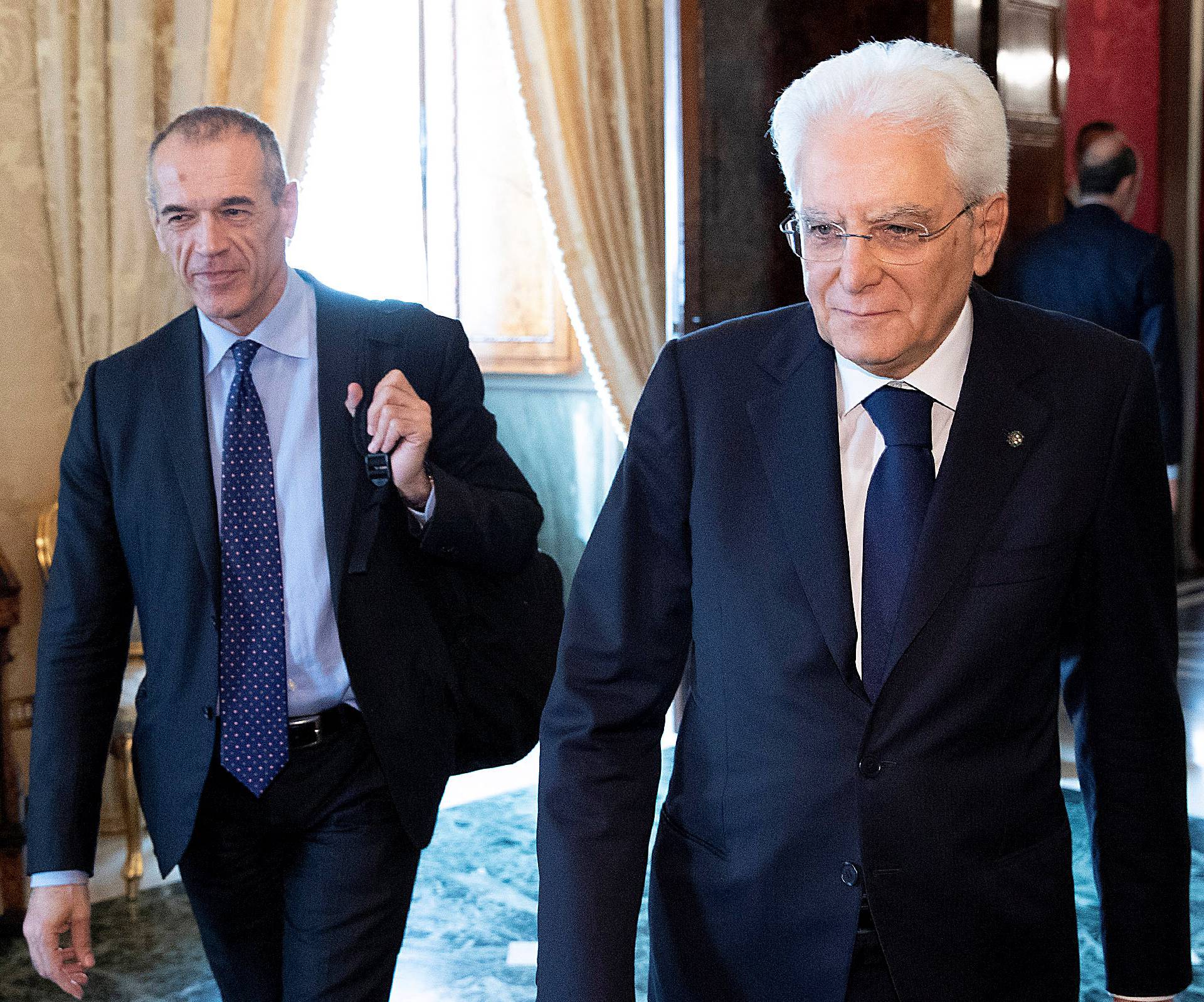 Former senior International Monetary Fund (IMF) official Carlo Cottarelli arrives for a meeting with the Italian President Sergio Mattarella at the Quirinal Palace in Rome