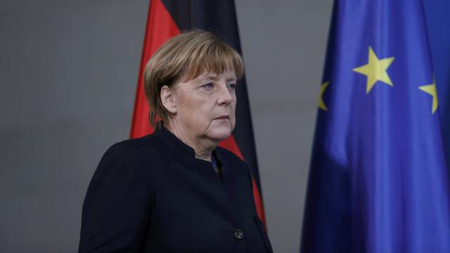 German Chancellor Angela Merkel arrives for a news conference in Berlin