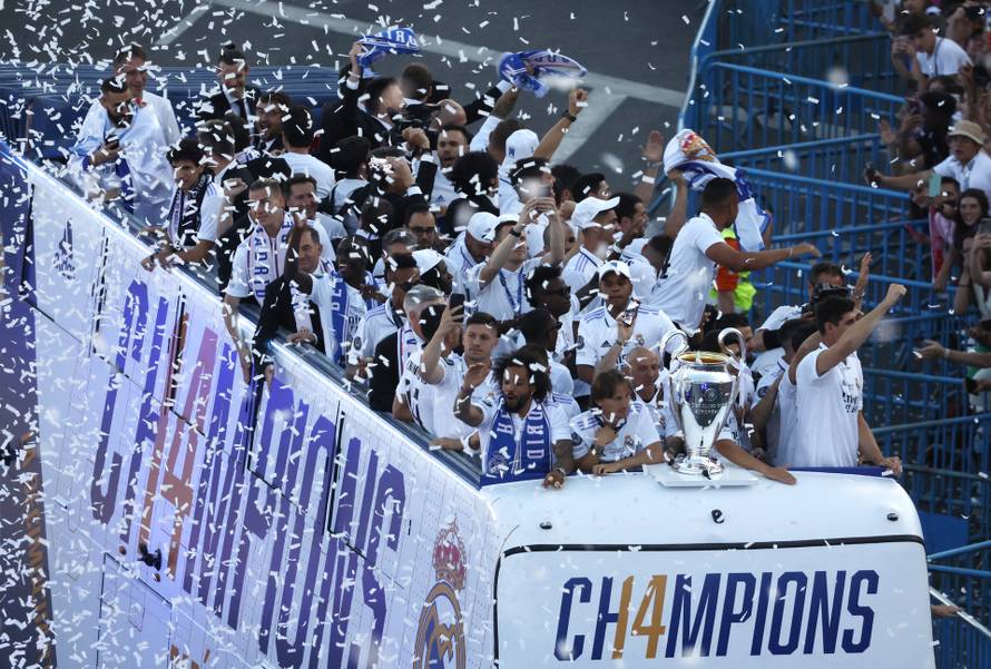 Real Madrid celebrate winning the Champions League Final with an open top bus parade