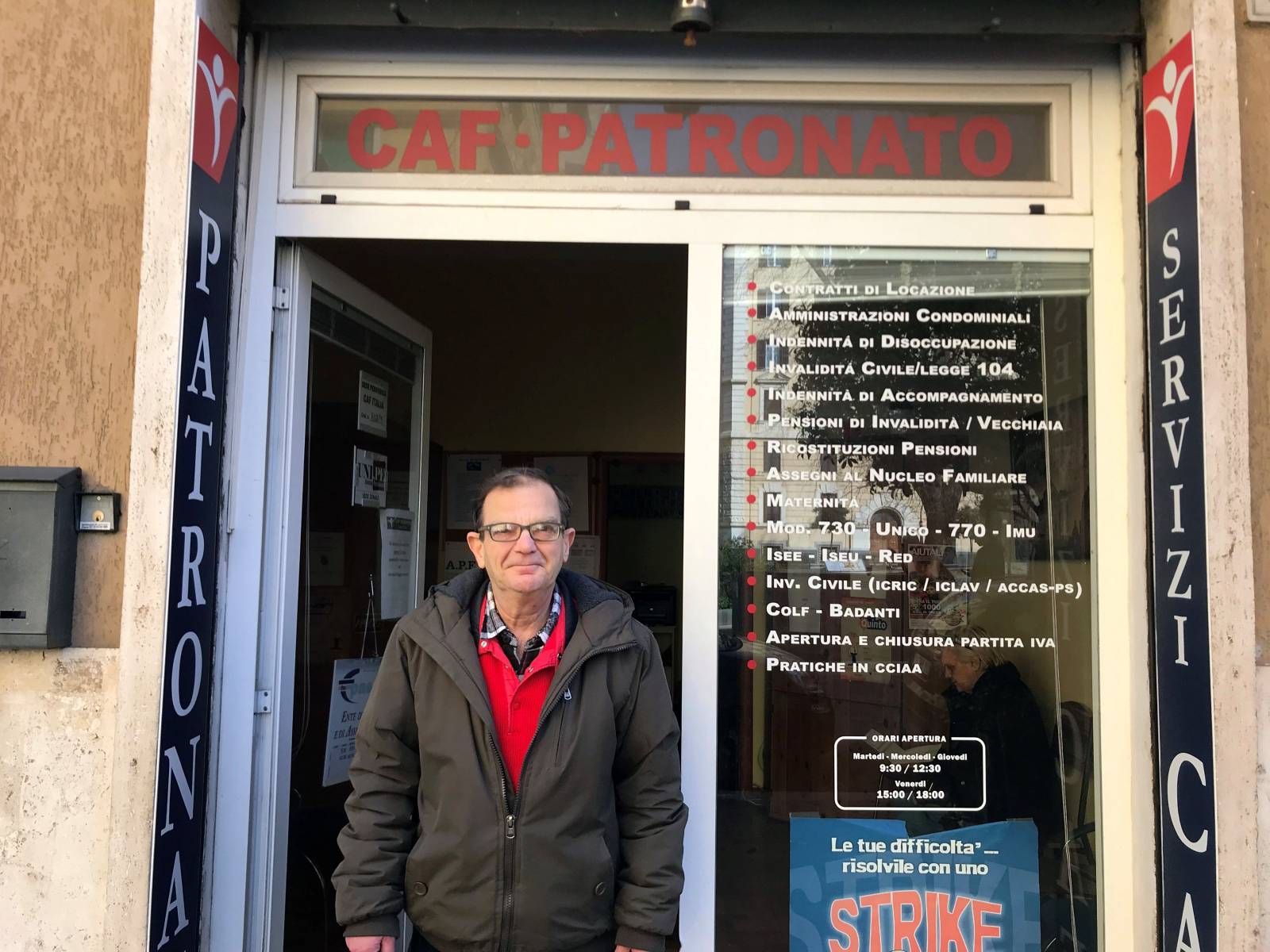 Unemployed Giuseppe Calafiore stands outside a tax assistance centre where he has applied for the new "citizens' income" poverty relief scheme, in Rome