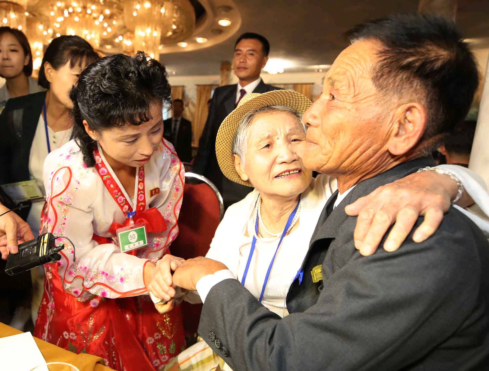North and South Korean family members meet during a reunion at North Korea's Mount Kumgang resort