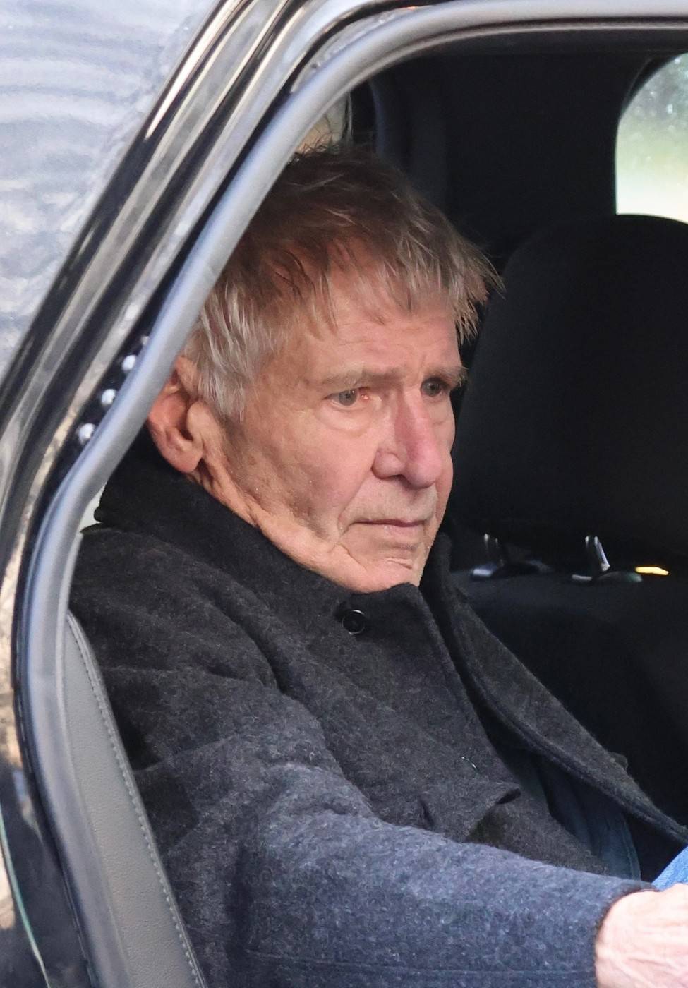 *EXCLUSIVE* Harrison Ford visibly upset after police return him to car after house check