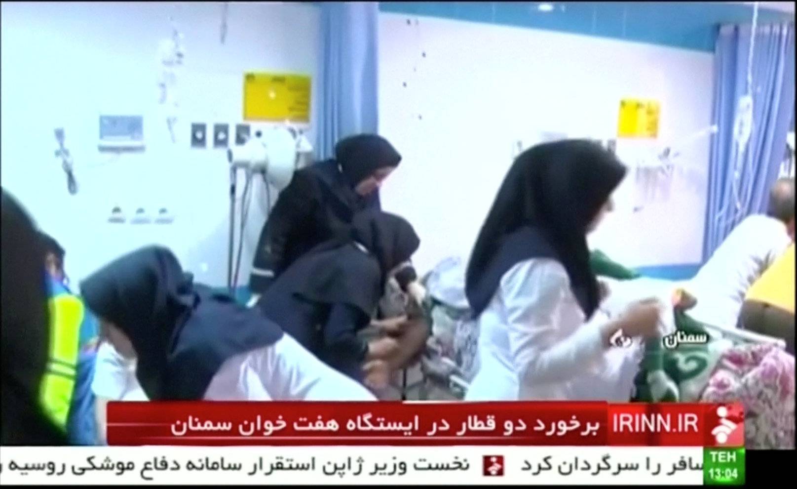 Still frame taken from video show injured people being treated at a local hospital following a collision between two passenger trains in the city of Shahroud, in the north-central province of Semnan