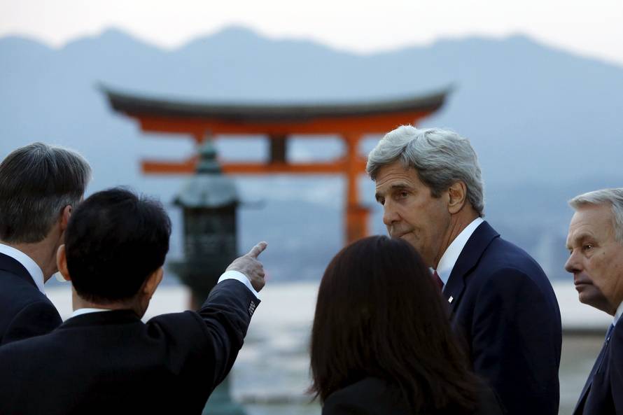 Kerry listens to Kishida as they and G7 foreign ministers visit the Itsukushima Shrine as they take a cultural break from their meetings in nearby Hiroshima to visit Miyajima Island