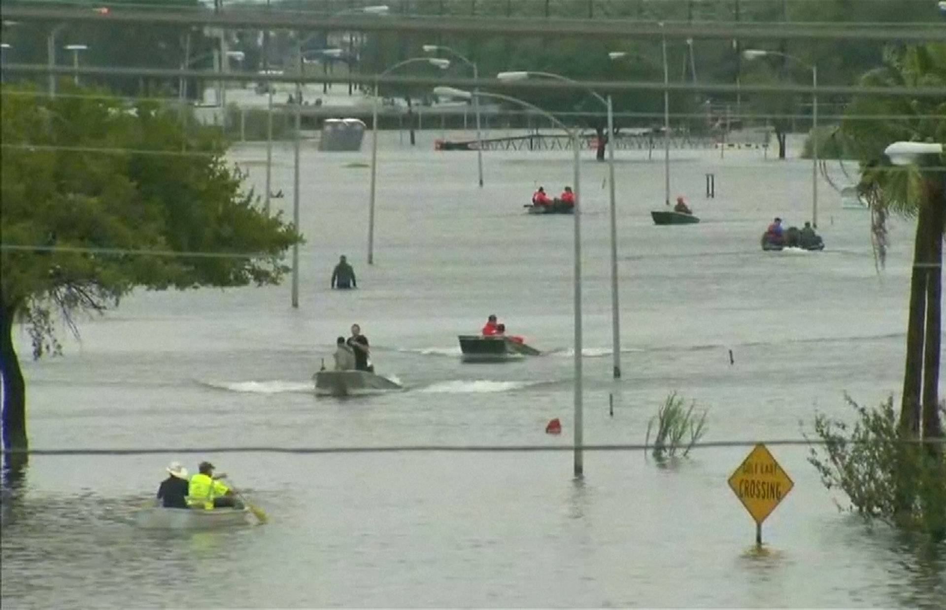 Rescue boats navigate flood waters of Tropical Storm Harvey in Port Arthur