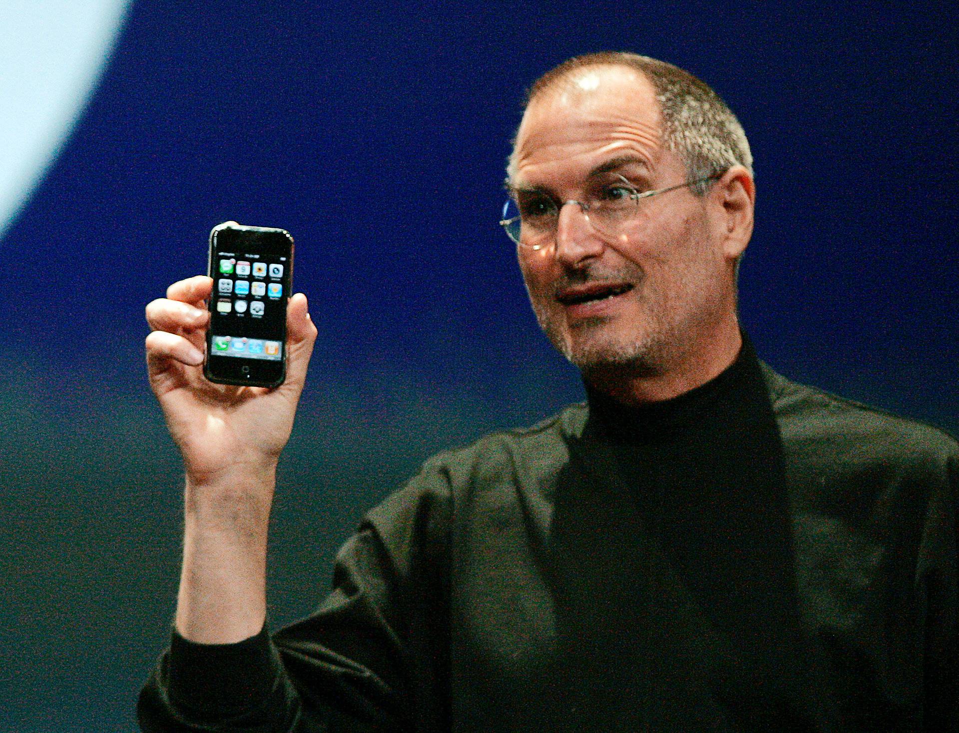 FILE PHOTO --  Apple Chief Executive Officer Steve Jobs holds new iPhone in San Francisco