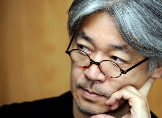 FILE PHOTO: Ryuichi Sakamoto of Japanese electropop band Yellow Magic Orchestra attends a news conference in Gijon