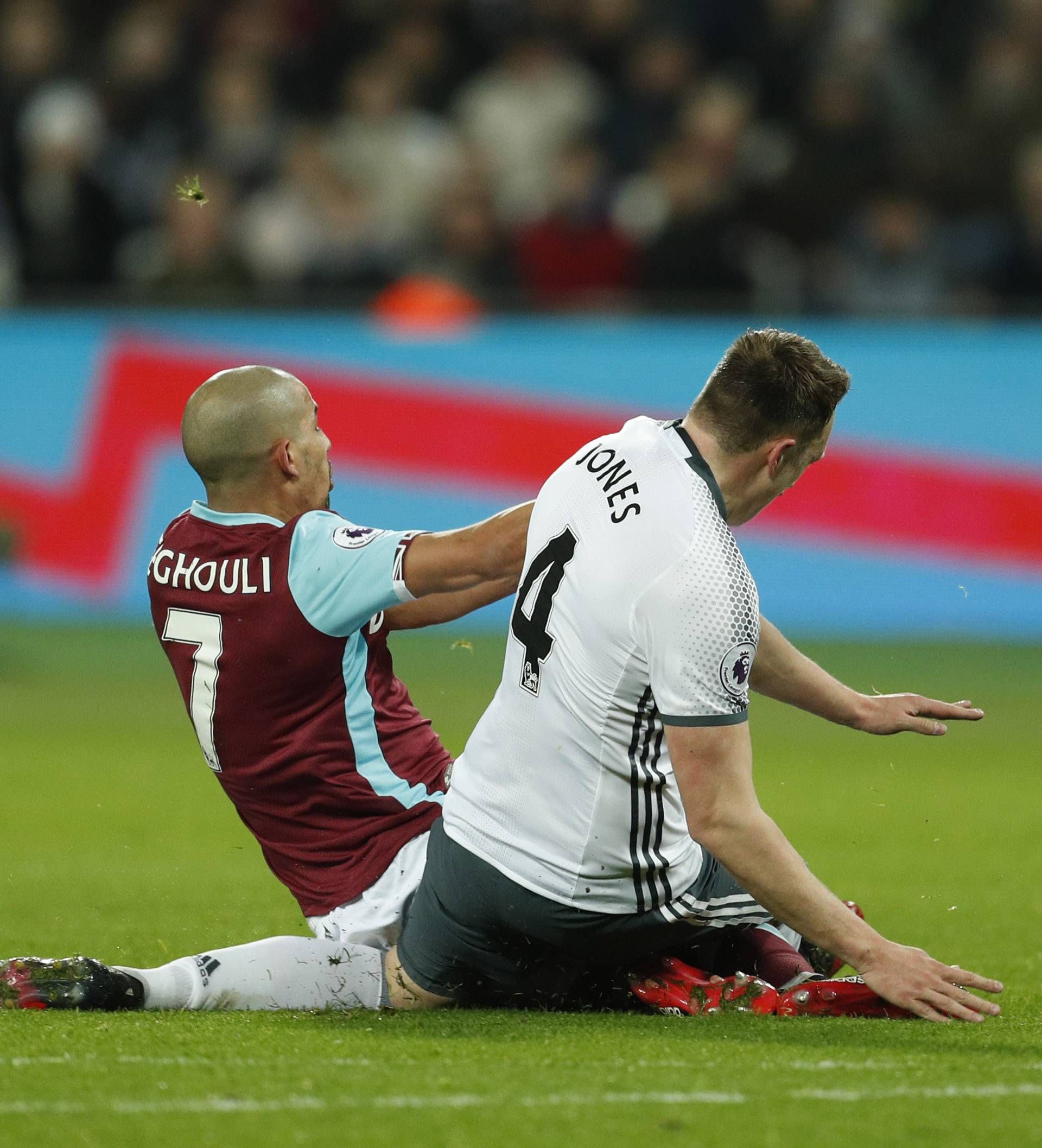 West Ham United's Sofiane Feghouli fouls Manchester United's Phil Jones and is later sent off