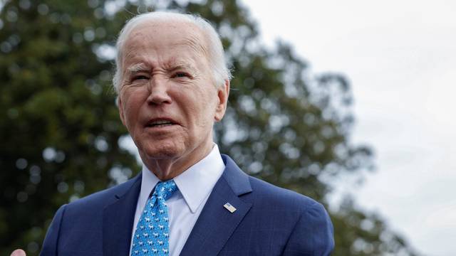 U.S. President Joe Biden speaks to the media before he departs the White House, in Washington