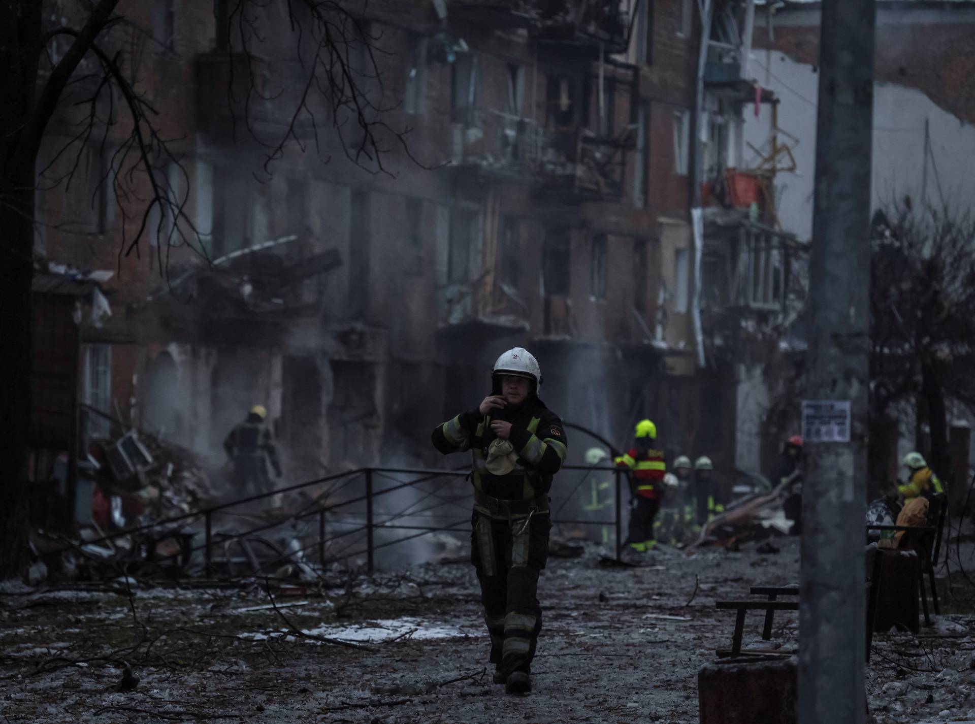 Rescuers work at a site of a residential building destroyed by a Russian missile attack in Vyshhorod