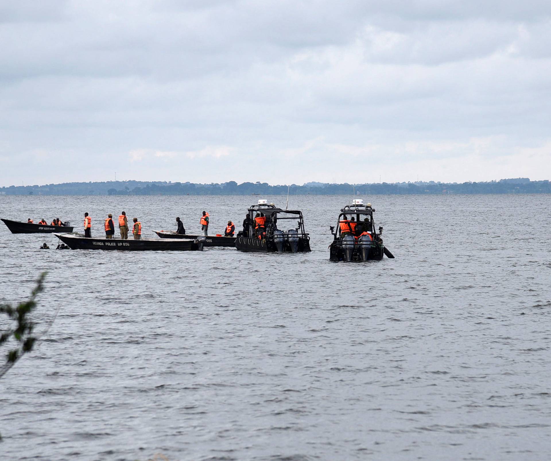 Rescue and recovery missions search for the bodies of dead passengers after a cruise boat capsized in Lake Victoria off Mukono district