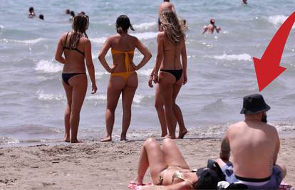 Prizor s hrvatske plaže: Zašto gleda desno? a) Nasukao se kit b) Ukočen je c)  Život mu je mio