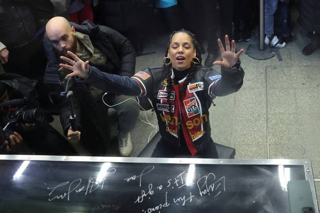 Singer Alicia Keys performs at St. Pancras International Station in London