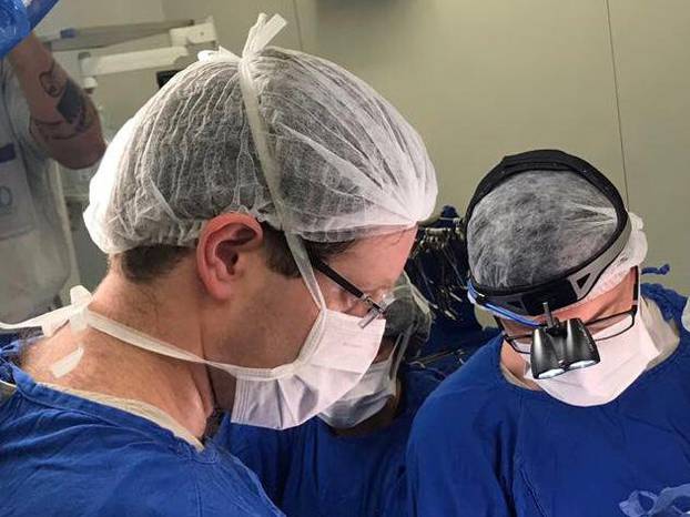 Doctors perform the womb transplant procedure at the hospital in Sao Paulo