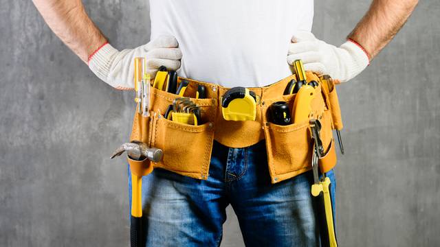 Unknown,Handyman,With,Hands,On,Waist,And,Tool,Belt,With