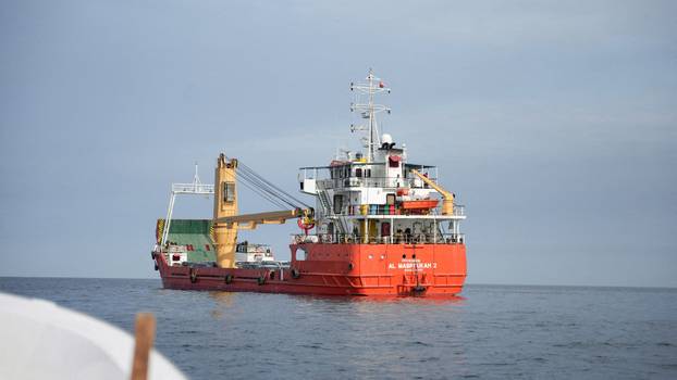 FILE PHOTO: Vessel at the Strait of Hormuz, off the coast of Oman&rsquo;s Musandam province