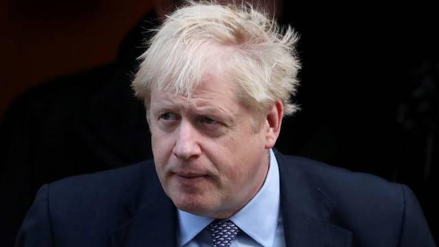 FILE PHOTO: Britain's Prime Minister Boris Johnson leaves Downing Street to head for the House of Commons as parliament discusses Brexit, sitting on a Saturday for the first time since the 1982 Falklands War, in London