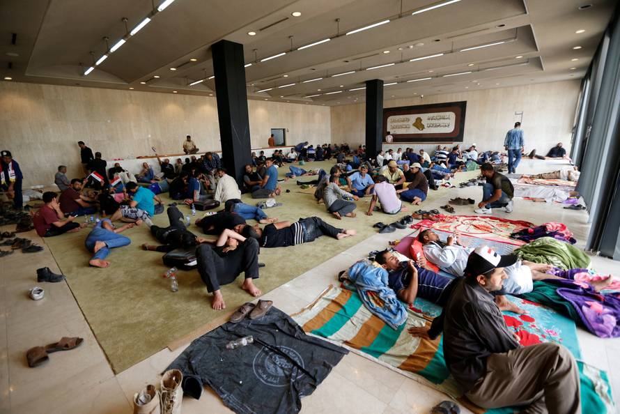 Followers of Iraqi Shi'ite cleric Moqtada al-Sadr gather at Grand Festivities Square within the Green Zone in Baghdad