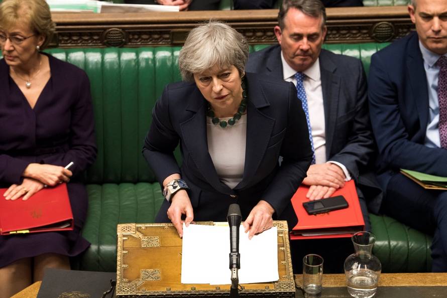 Britain's Prime Minister Theresa May speaks in Parliament following the vote on Brexit in London