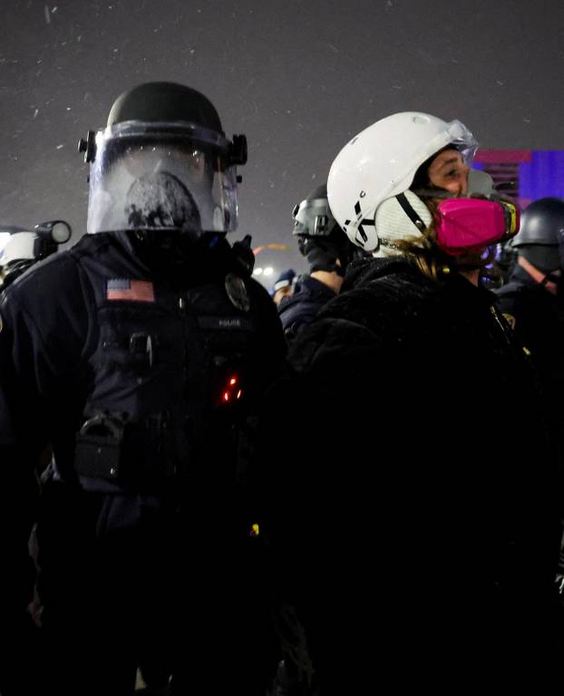 Protest outside the hotel where Bovino, who has been removed from his role, is reportedly staying, in Maple Grove
