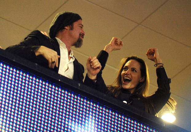 Angelina Jolie and Brad Pitt at Superbowl - Miami