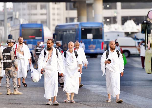 Muslims make their way to Mina during hajj pilgrimage from the holy city of Mecca, Saudi Arabia