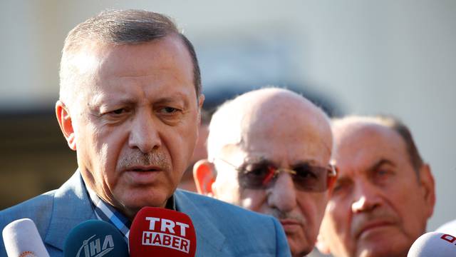 Turkey's President Erdogan talks to media after the Eid al-Fitr prayers in Istanbul