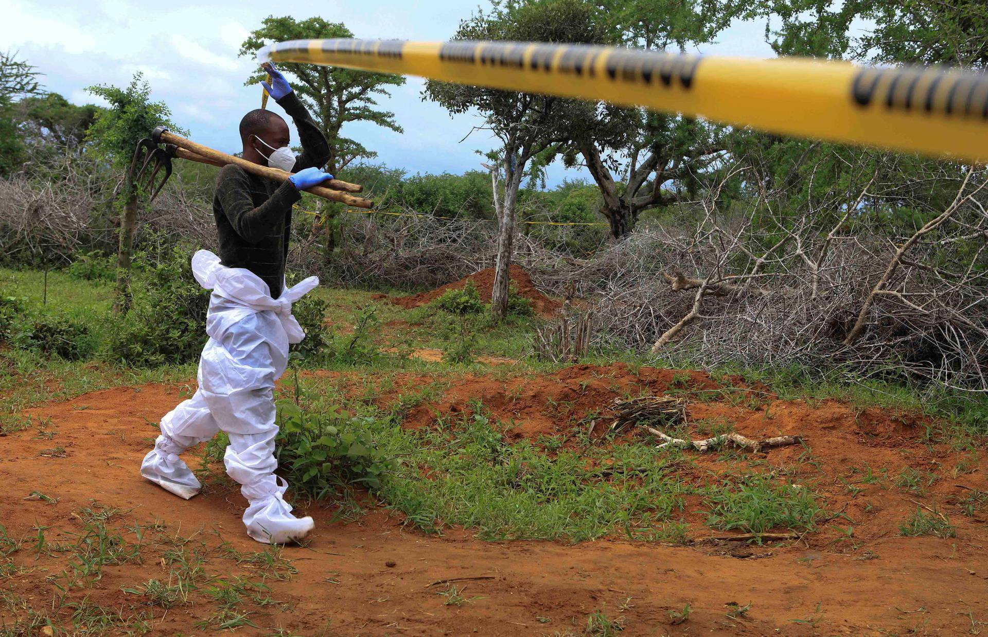 Kenya police exhume remains from suspected Christian cult graves in Kilifi