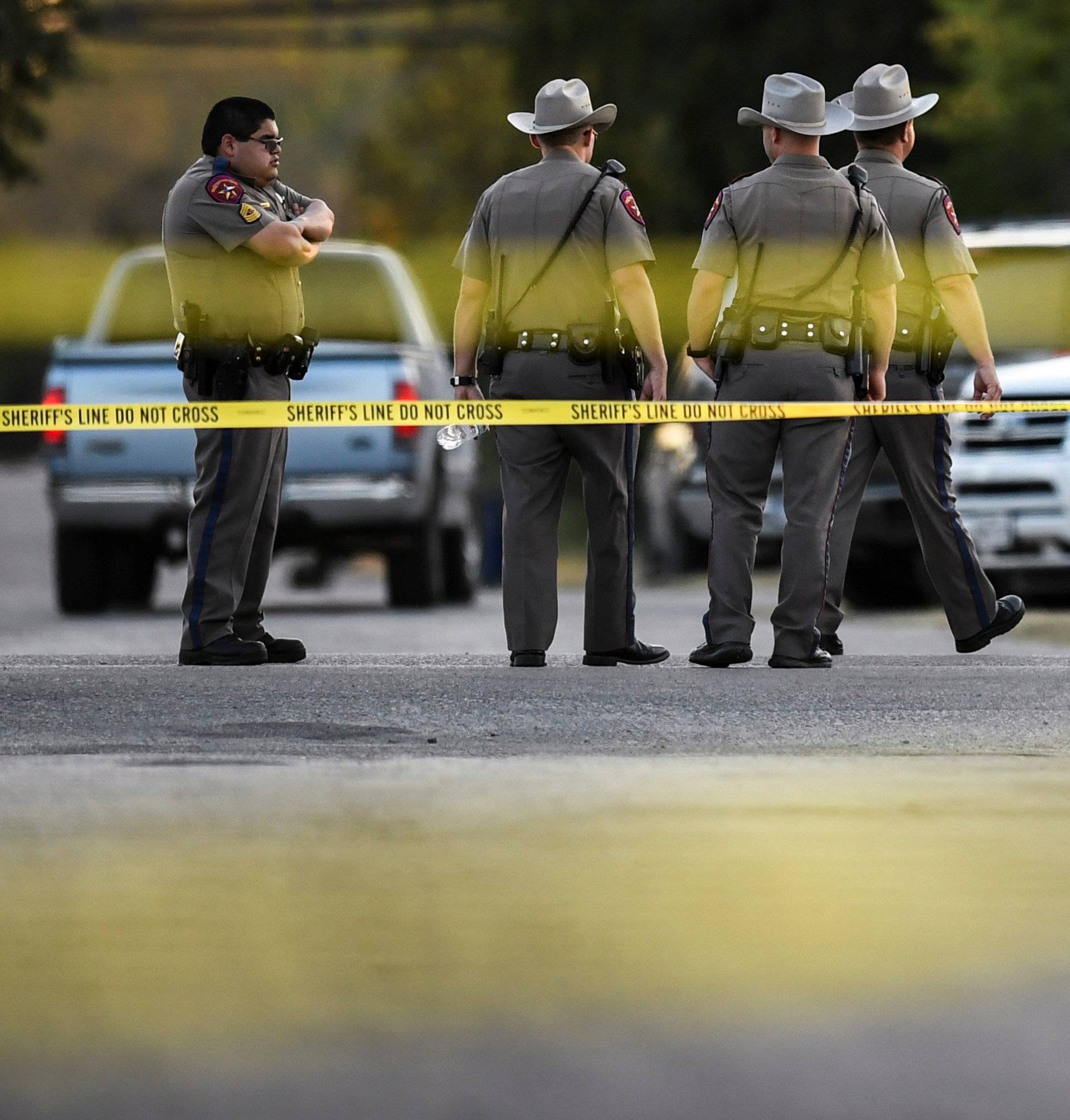 Volunteers distrubte water to law enforcement near First Baptist Church after mass shooting in Sutherland Springs, Texas