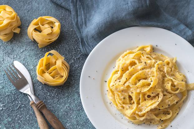 Portion of fettuccine Alfredo