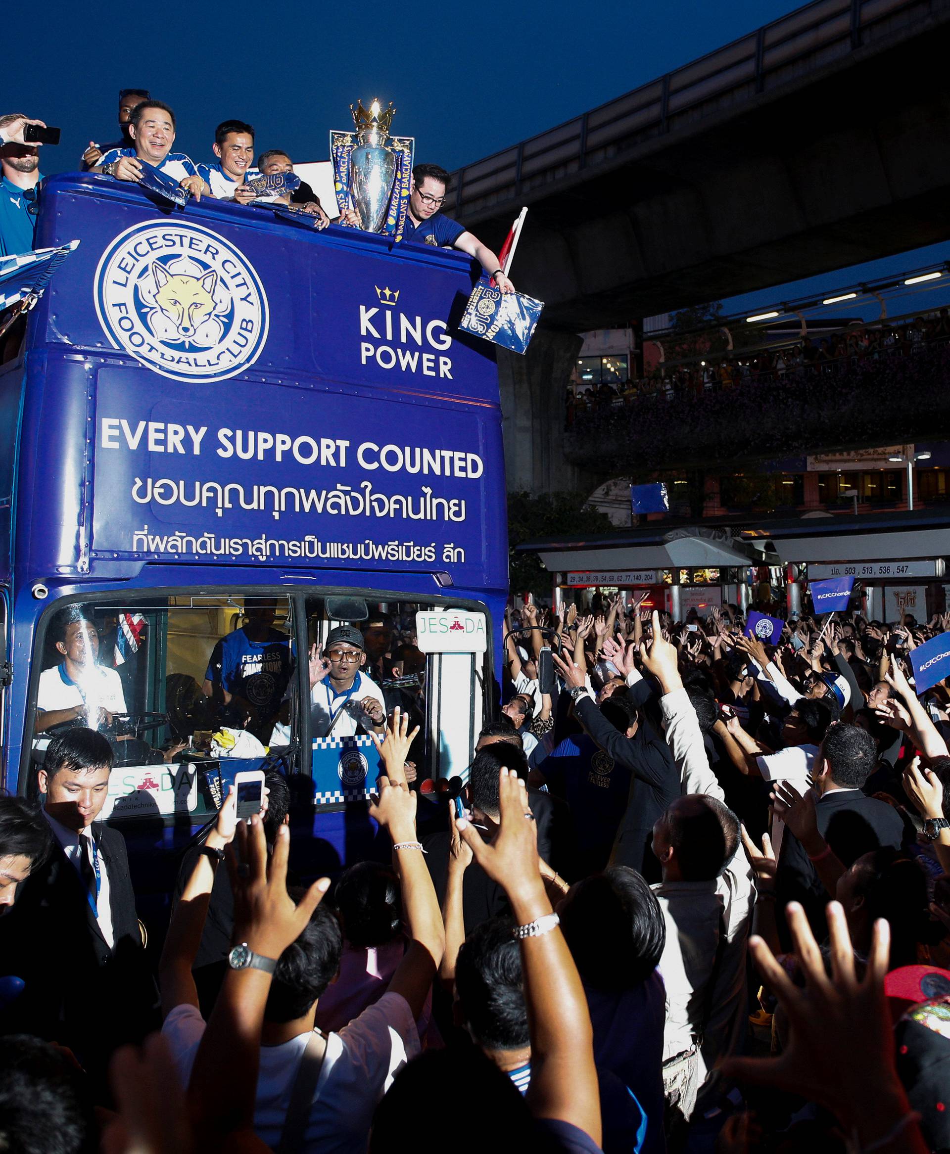 Leicester City soccer club's team members parade to celebrate club's English Premier League title in Bangkok