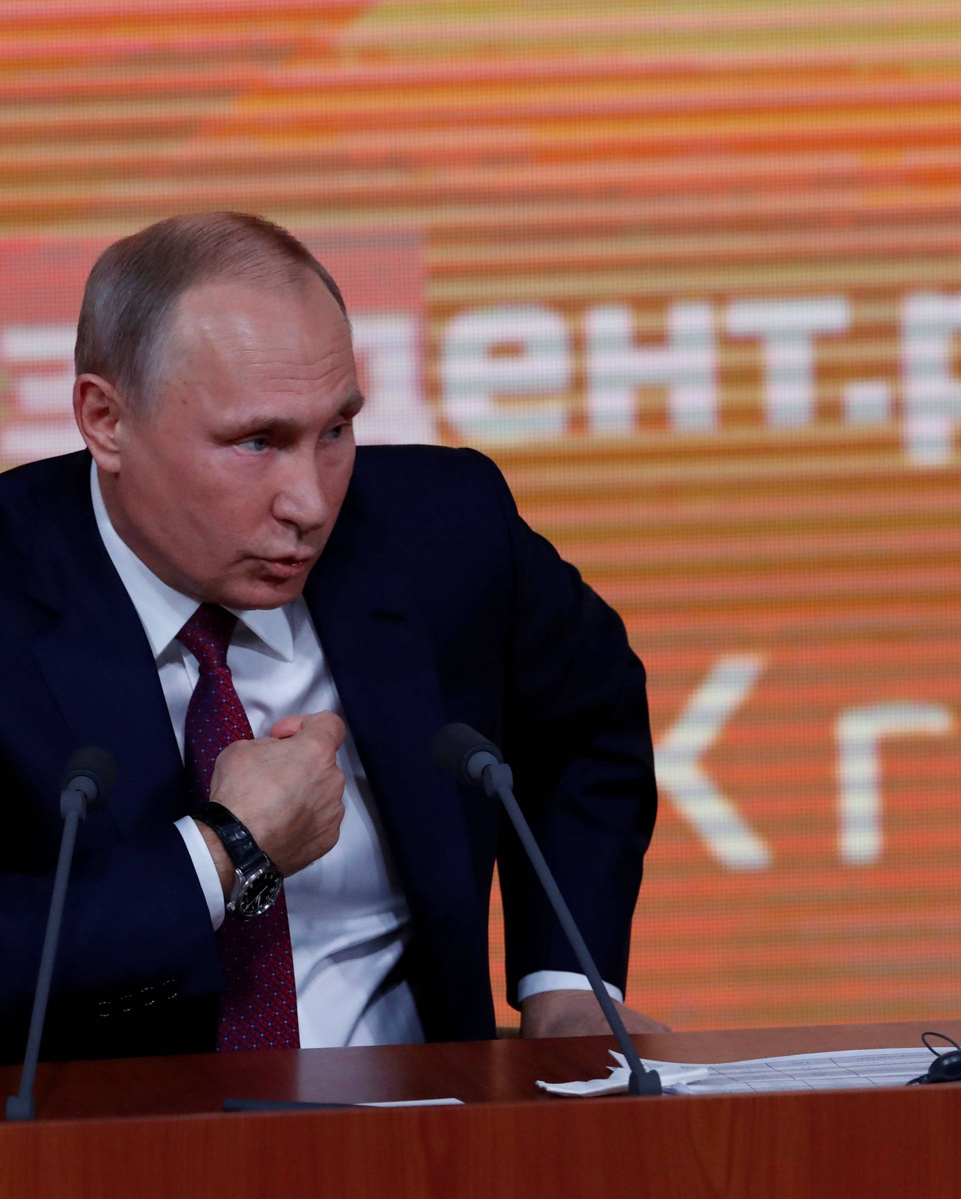 Russian President Vladimir Putin speaks during his annual end-of-year news conference in Moscow