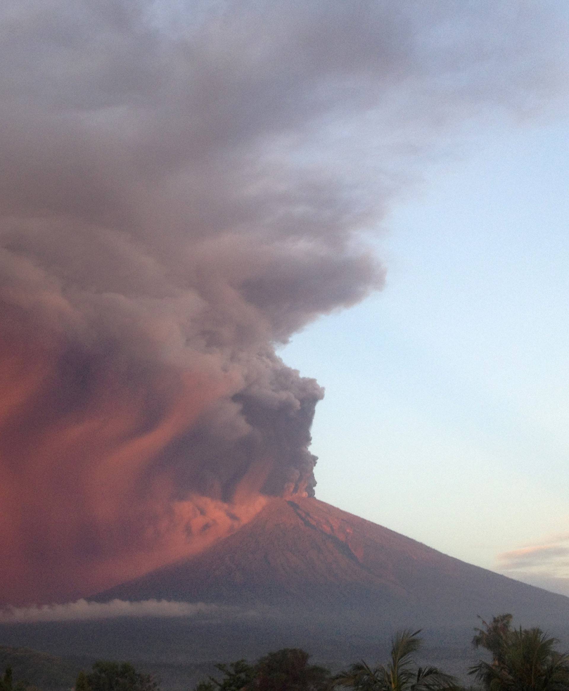 Indonesia's Mount Agung volcano erupts as seen from Amed, Karangasem, Bali