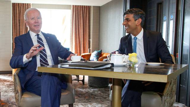 FILE PHOTO: U.S. President Joe Biden meets with Britain's PM Rishi Sunak in Belfast