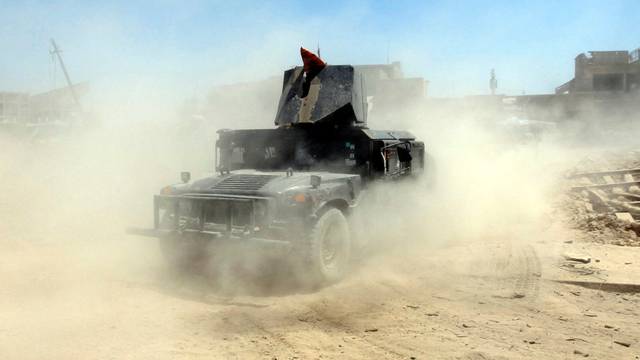 A military vehicle of Iraqi Counter Terrorism Services (CTS) is seen in the Old City of Mosul