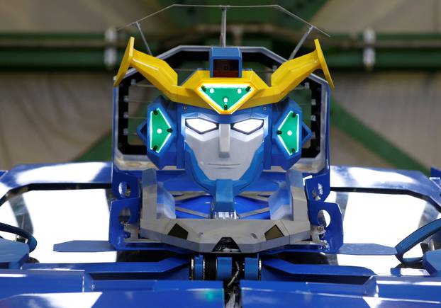 New transforming robot called "J-deite RIDE" that transforms itself into a passenger vehicle, developed by Brave Robotics Inc, Asratec Corp and Sansei Technologies Inc, is unveiled at a factory near Tokyo