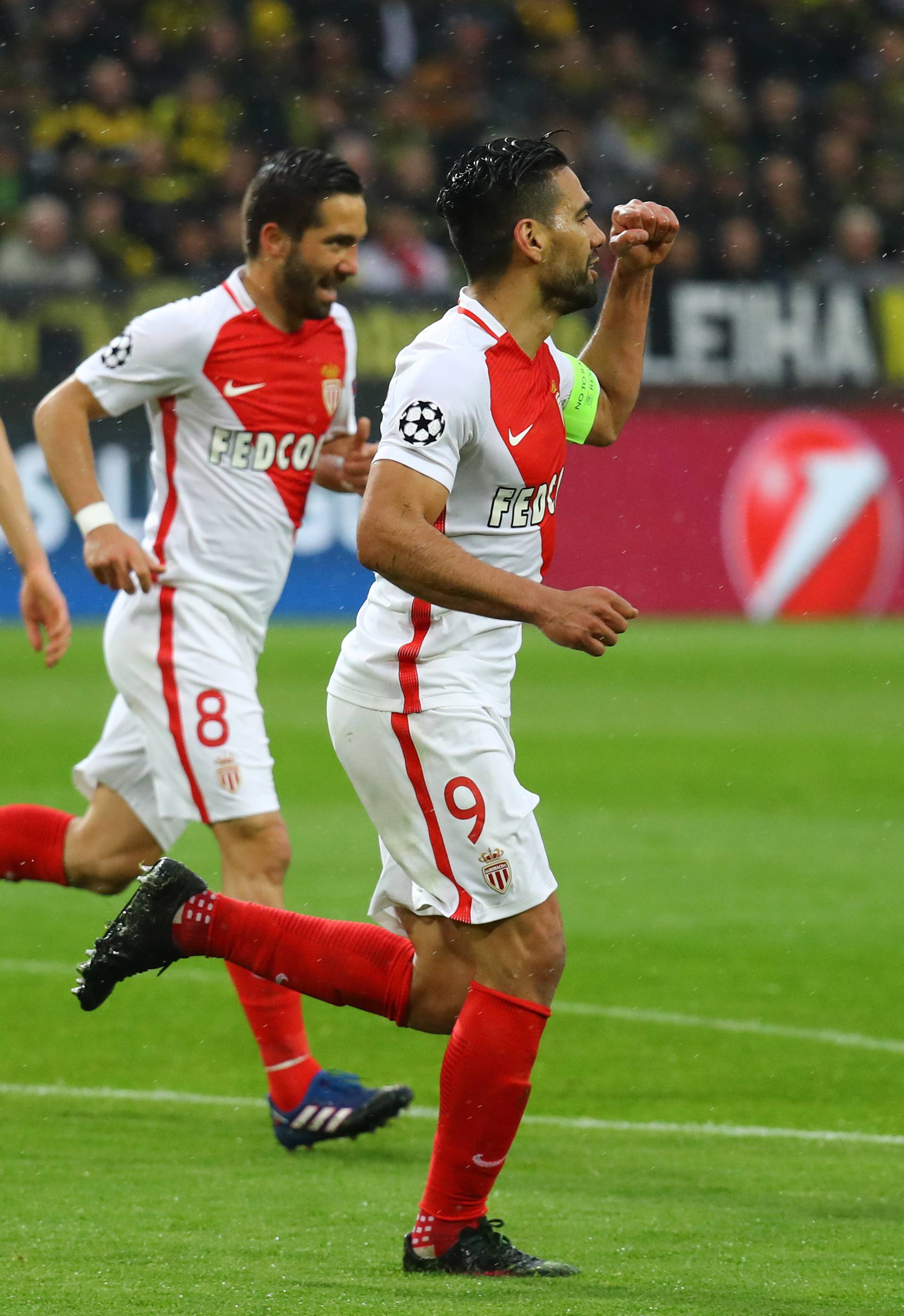 Monaco's Radamel Falcao celebrates after Borussia Dortmund's Sven Bender scored a own goal and the second for Monaco