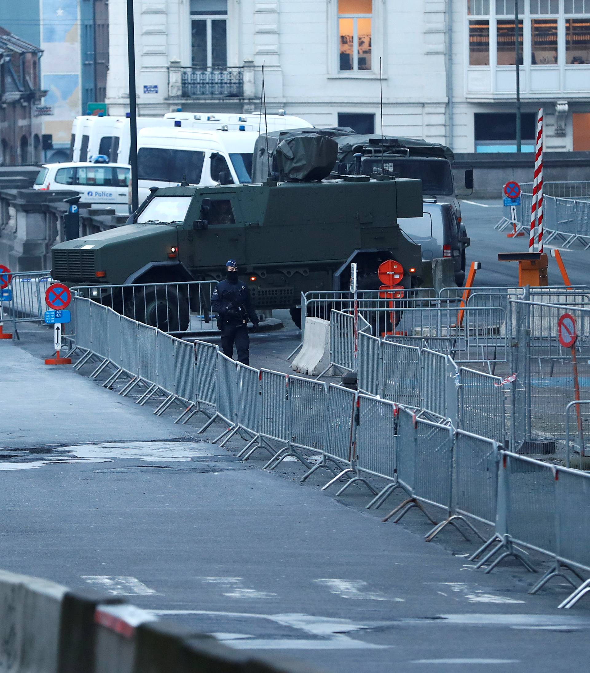 Police and soldiers guard the courthouse ahead of the trial of Salah Abdeslam, one of the suspects in the 2015 Islamic State attacks in Paris, in Brussels