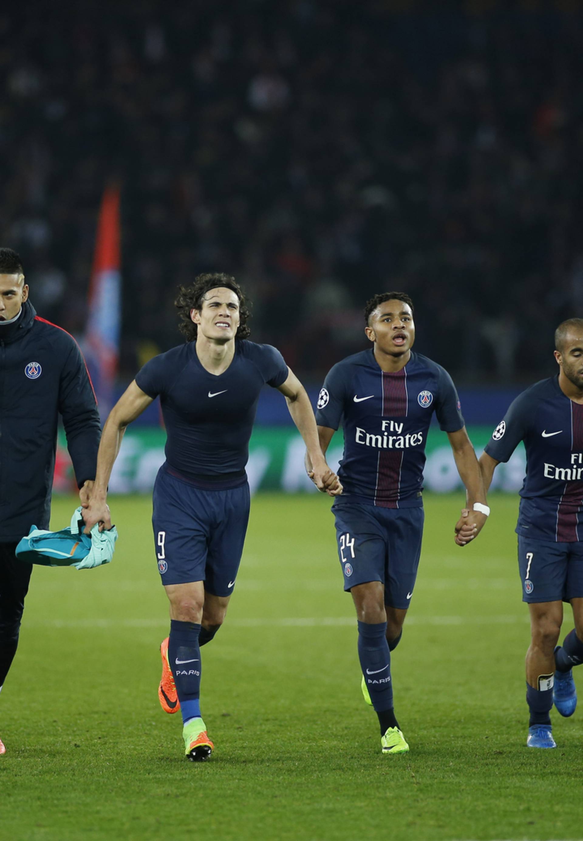 Paris Saint-Germain's players celebrate after the game