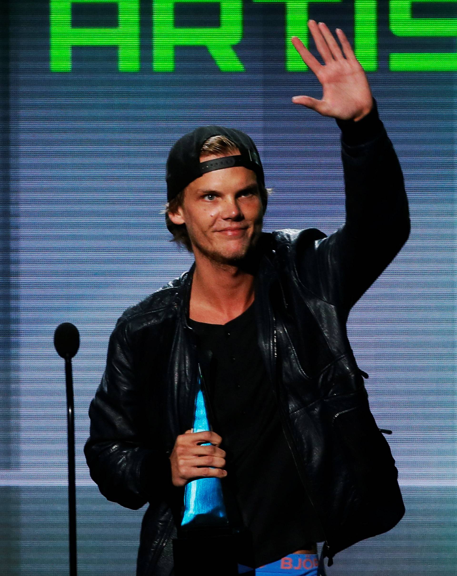 FILE PHOTO: Avicii accepts the favorite electronic dance music artist award at the 41st American Music Awards in Los Angeles