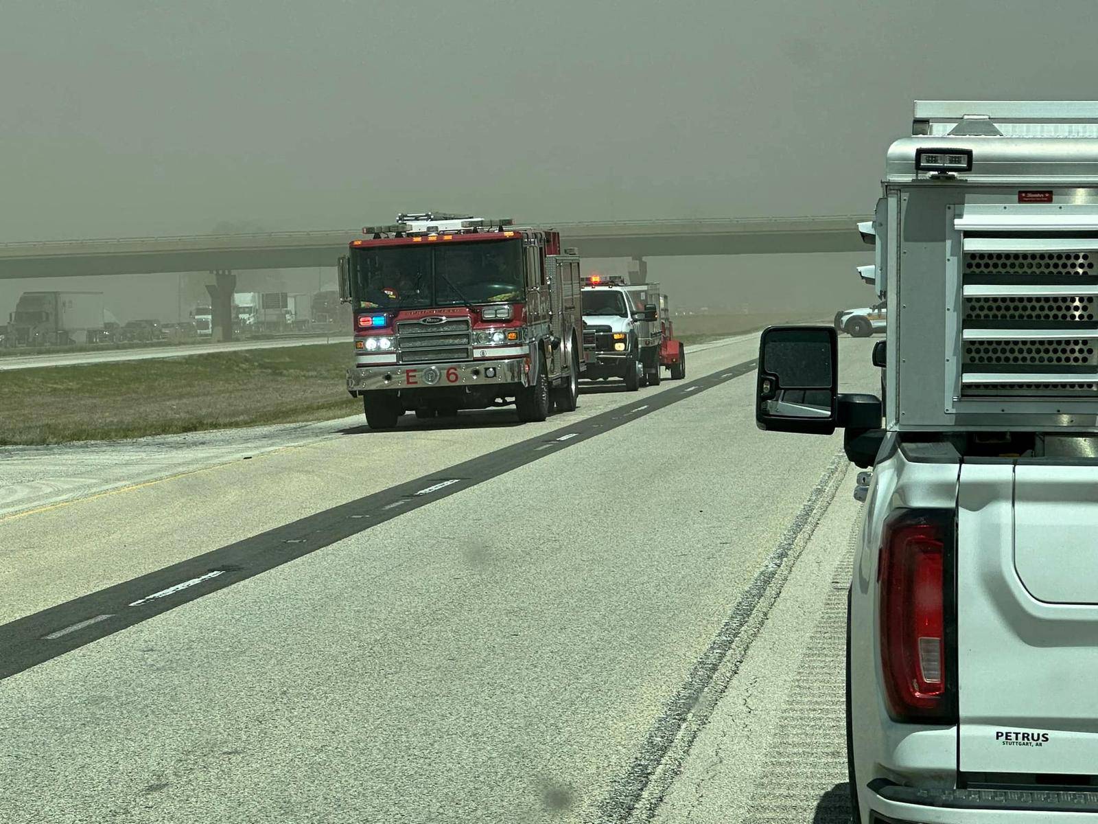 An emergency vehicle responds to a dust storm